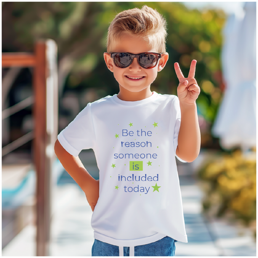 Child wearing sunglasses and a white t-shirt with a motivational message, Be the reason someone is included today standing outdoors.