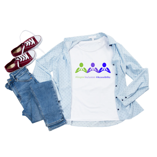 White t-shirt with accessibility logo, light blue shirt, jeans, and red sneakers on a white background