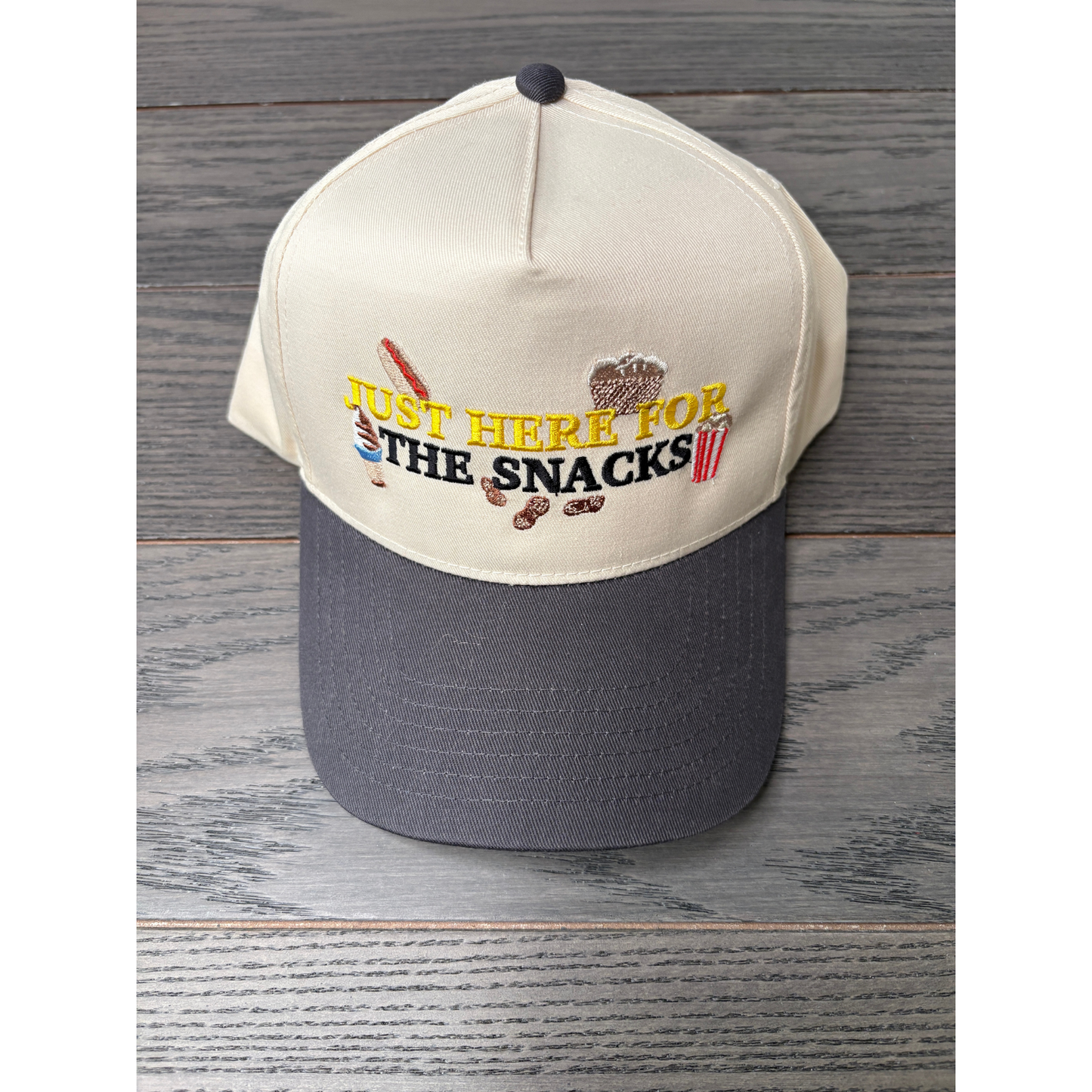 Just here for the snacks embroidered on a natural and gray hat