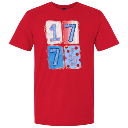 Red t-shirt with blue and white 1776 numbers in patchwork design on a white background