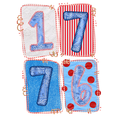 Four fabric patches with embroidered numbers on a white background
