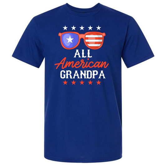 Blue t-shirt with 'All American Grandpa' text and sunglasses graphic on a white background