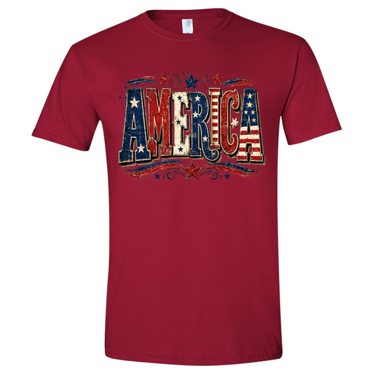 Red t-shirt with 'AMERICA' text in American flag design on a white background
