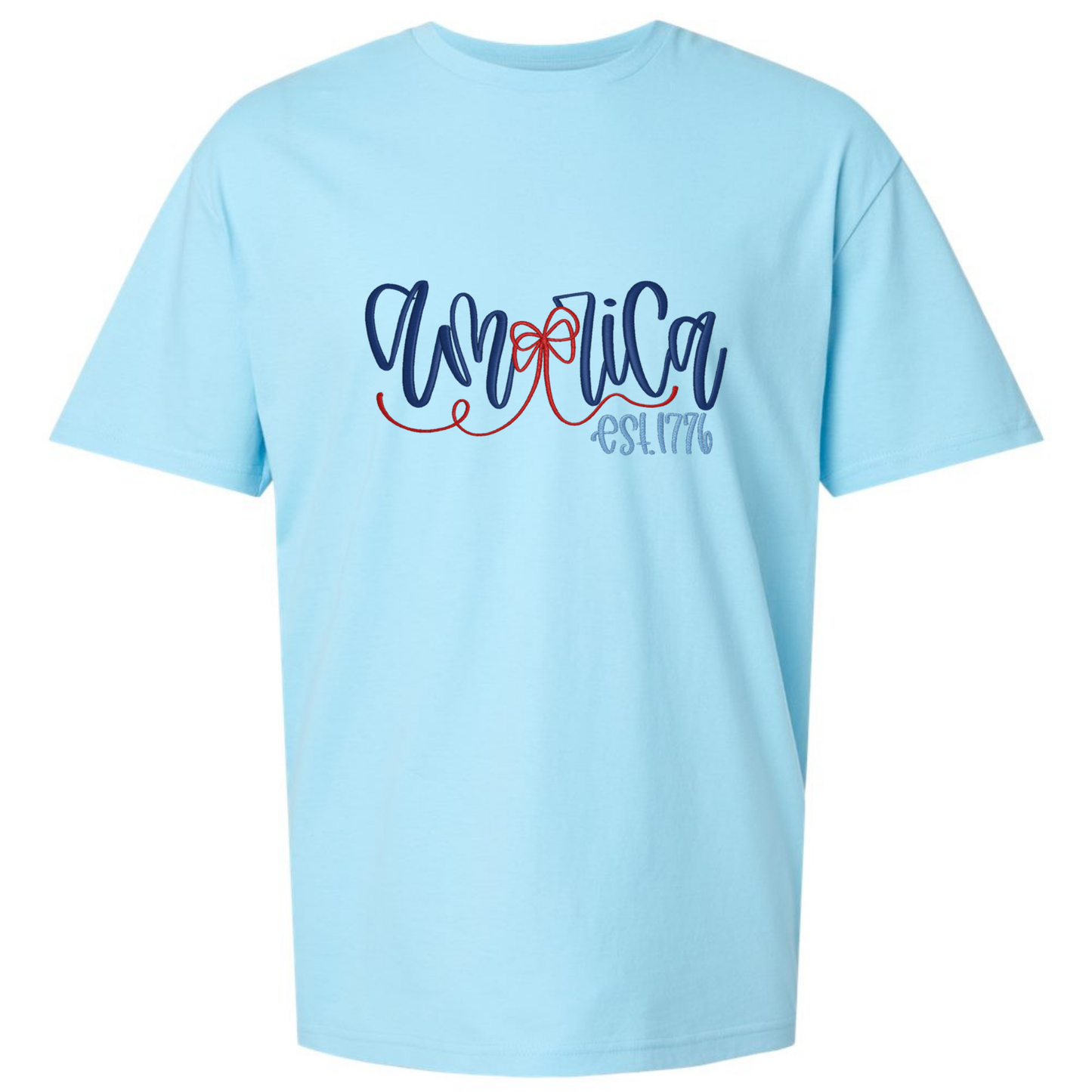 Light blue t-shirt with 'America Est. 1776' text design on a white background