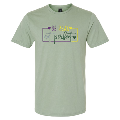 Light green t-shirt with motivational quote on a white background