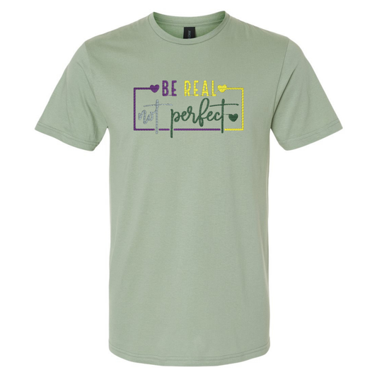 Light green t-shirt with motivational quote on a white background