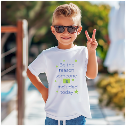Child wearing sunglasses and a white t-shirt with a motivational message, Be the reason someone is included today standing outdoors.