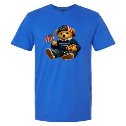 Blue t-shirt with a bear graphic holding an American flag and a hot dog on a white background