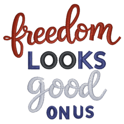 Embroidered text 'freedom looks good on us' with red, blue, and gray colors on a white background.