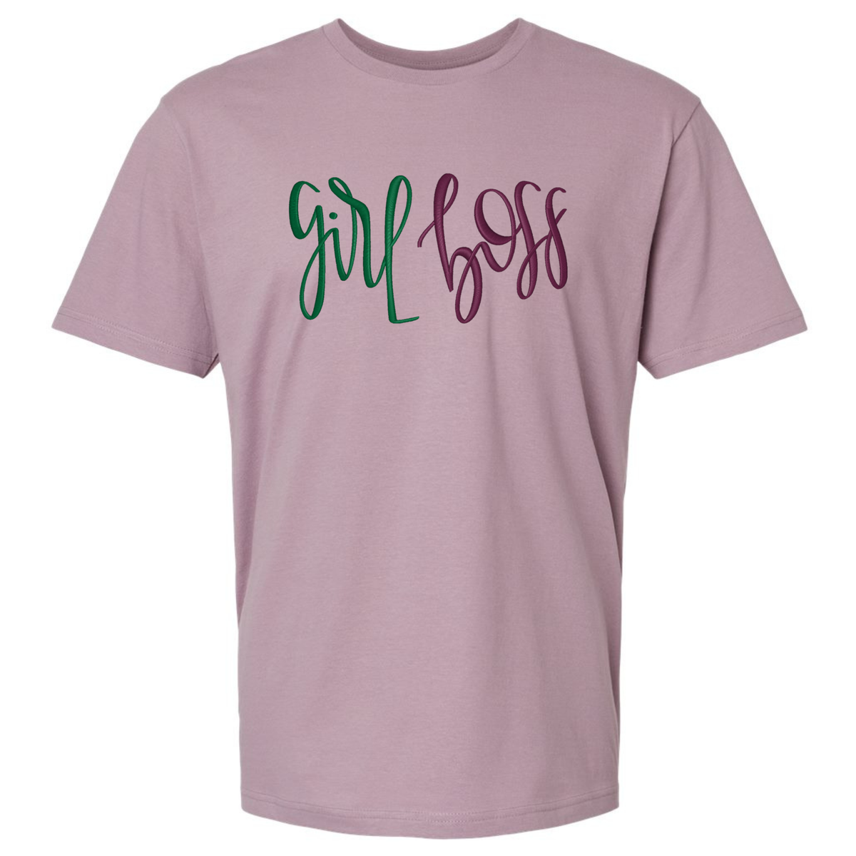 A dusty purple short-sleeve t-shirt featuring text 'girl boss' embroidered across the chest in green and dark purple cursive script.