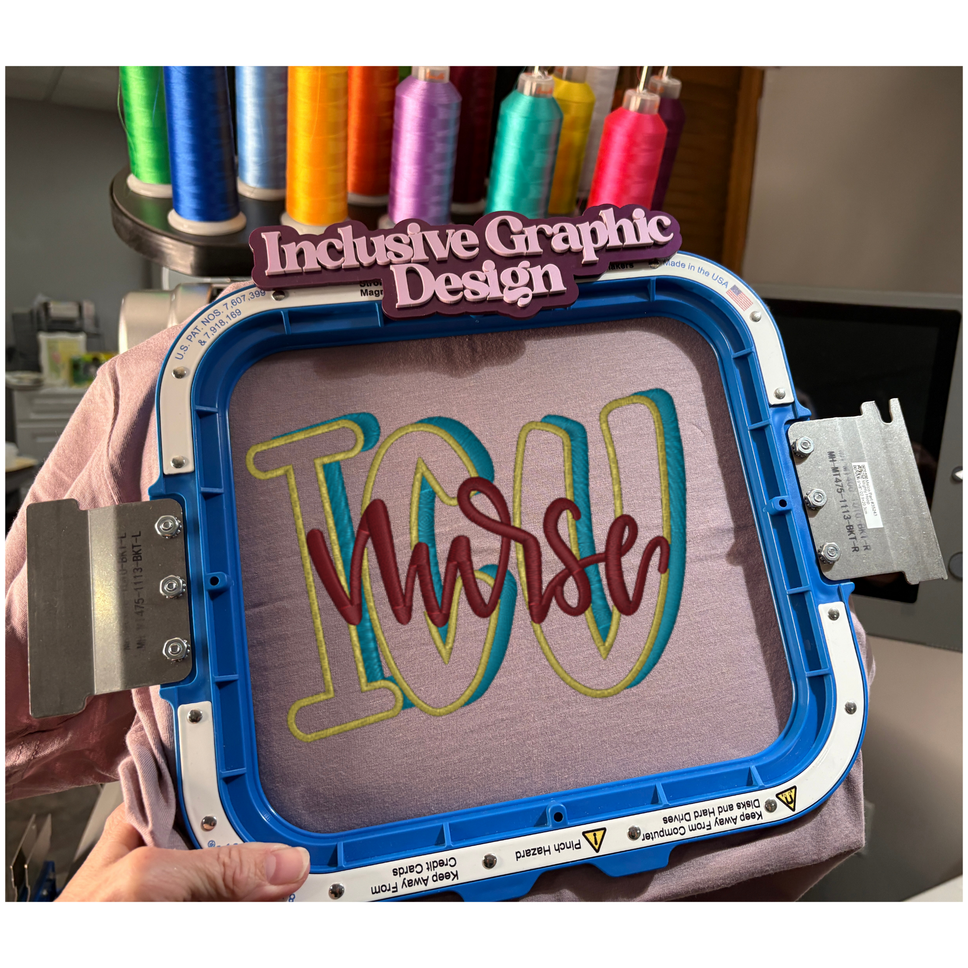 Embroidery hoop with 'Nurse' text in colorful letters, held by a person with spools of thread in the background.