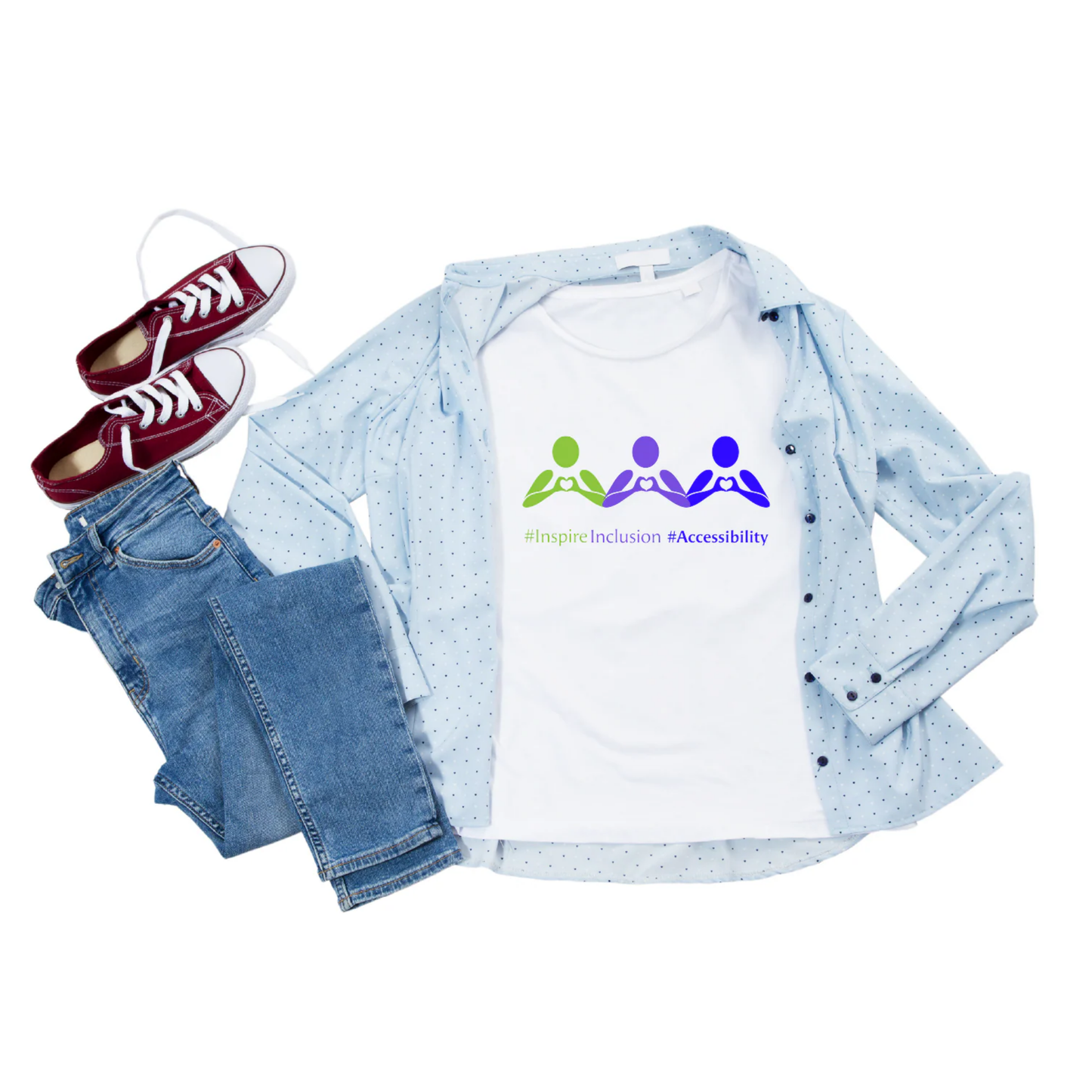 White t-shirt with accessibility logo, light blue shirt, jeans, and red sneakers on a white background