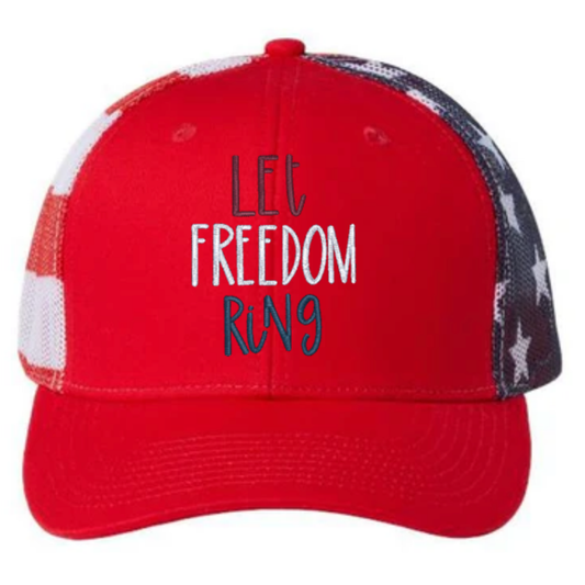 Red cap with 'Let Freedom Ring' text on a white background