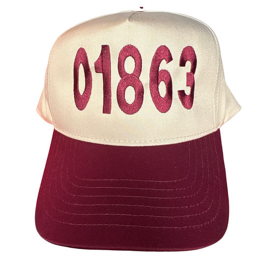 a maroon and tan hat with the zip code 01863