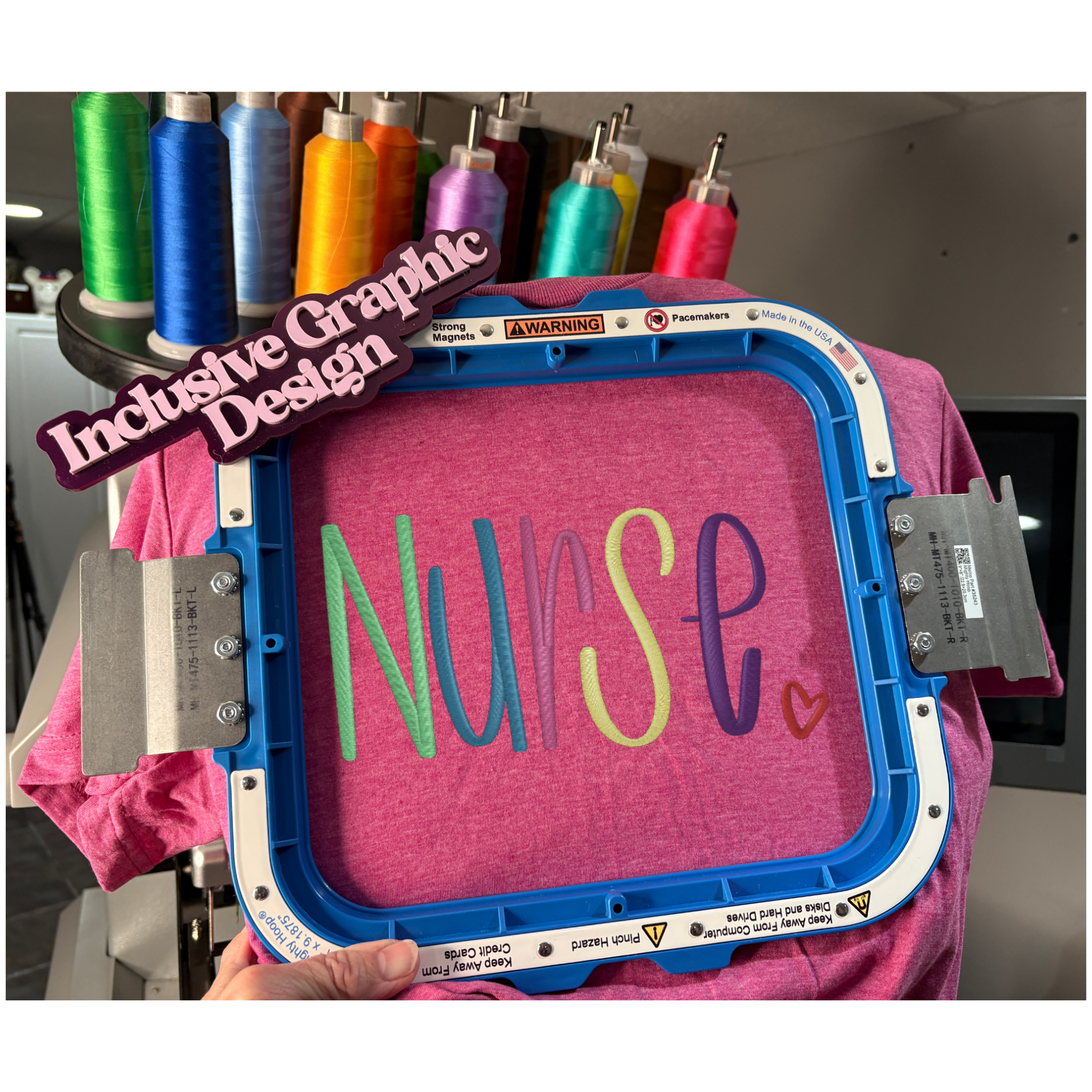 Embroidery hoop with 'Nurse' text on a pink fabric, surrounded by colorful thread spools.