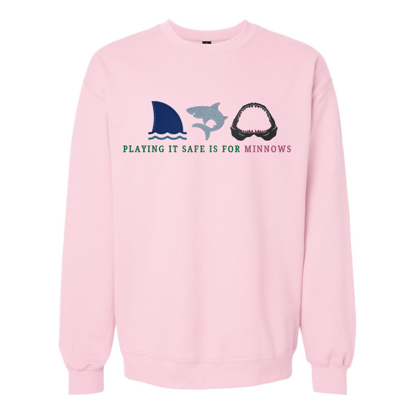 Pink sweatshirt with shark and dolphin graphic and text on a white background