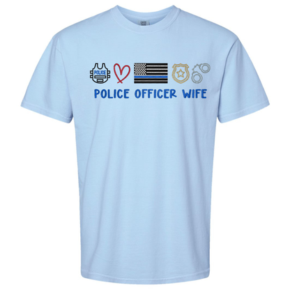 Light blue t-shirt with police-themed graphics and text on a white background