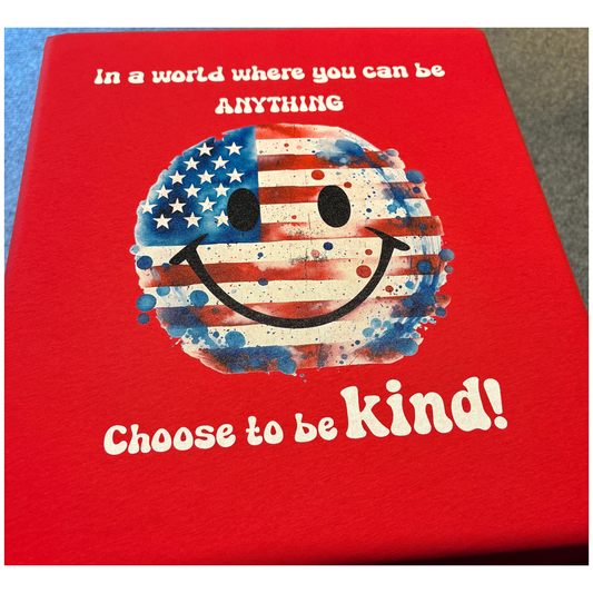 Red sweatshirt with a smiley face design and motivational text on a red background