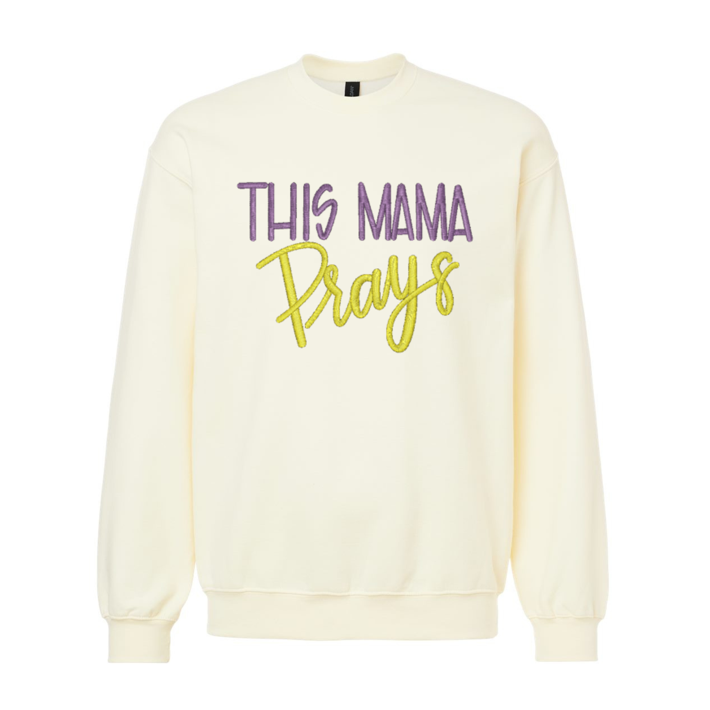 Cream-colored sweatshirt with 'This Mama Prays' text on a white background