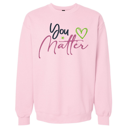 Pink sweatshirt with 'You Matter' text and heart graphic on a white background