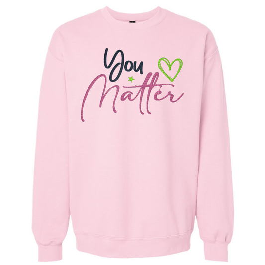 Pink sweatshirt with 'You Matter' text and heart graphic on a white background