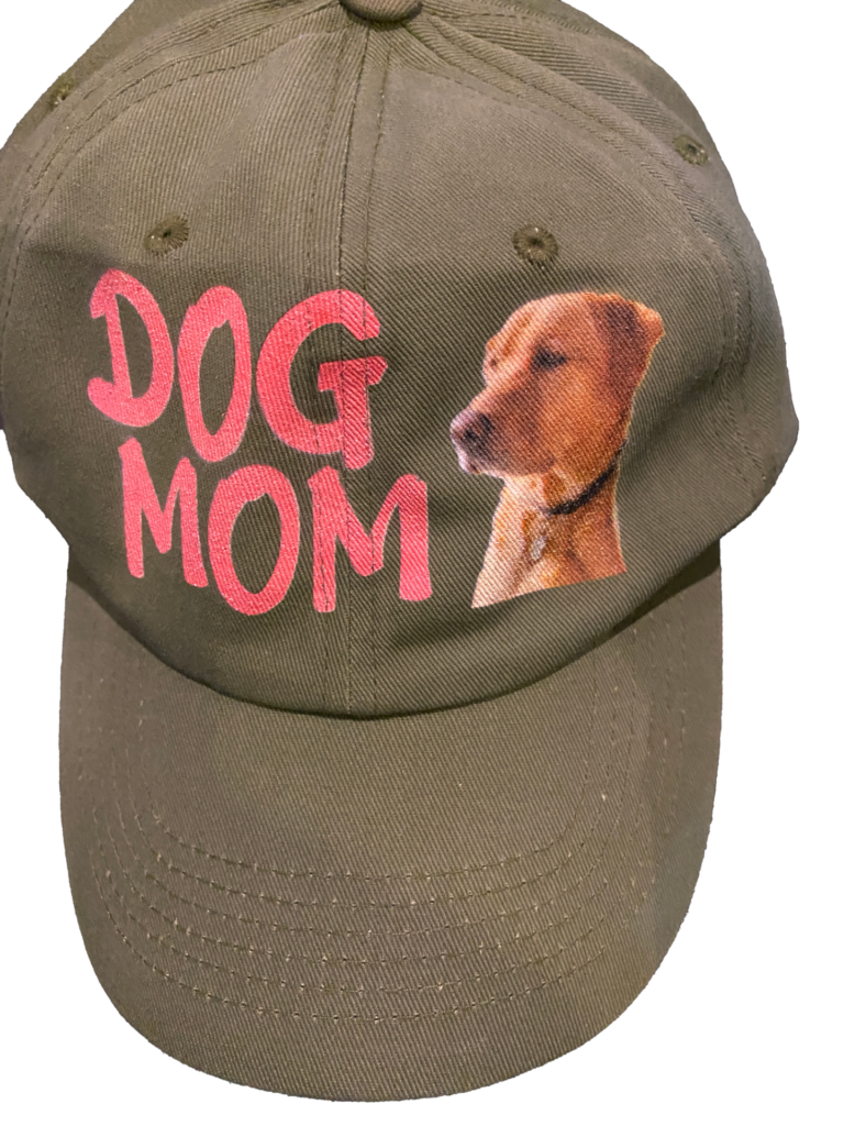 Green hat saying dog mom with an image of a dog